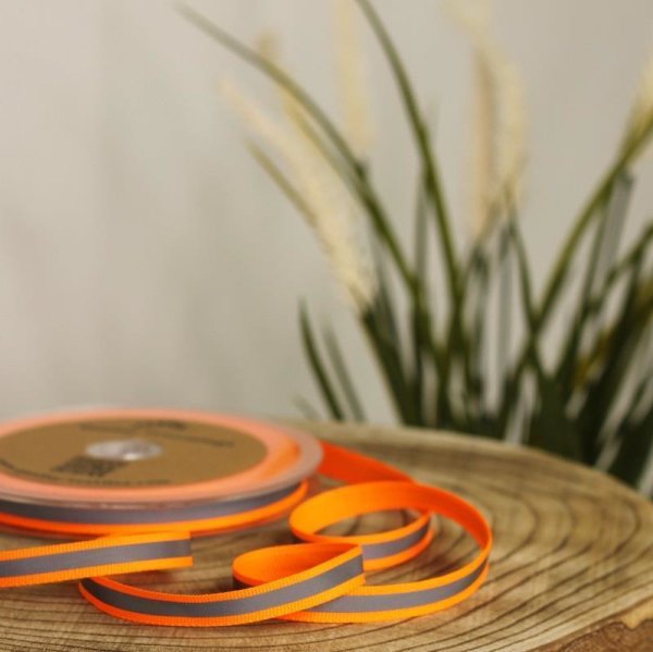 https://www.pepelinchen.de/media/image/product/32287/md/reflektorband-zum-aufnaehen-10-mm-breit-neon-orange.jpg